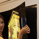 Illustration for article titled This 55-Inch LG Display Peels Off the Wall Like a Poster